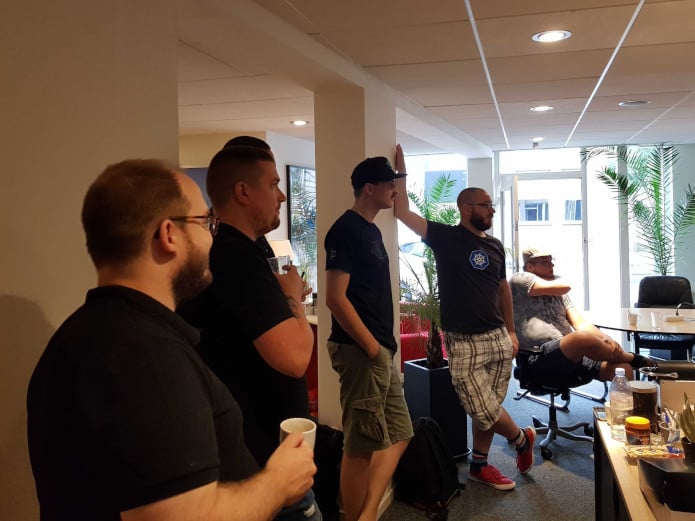 FullstaQathon kick-off: engineers listening in to the kick-off speech